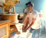 Dave Bauer making stone ground flour